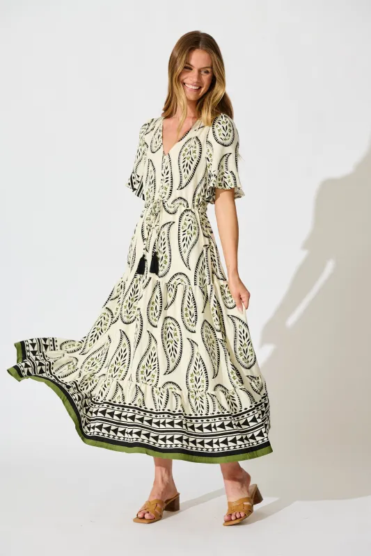 Effia Midi Dress in White with Black Paisley Print sold by St Frock