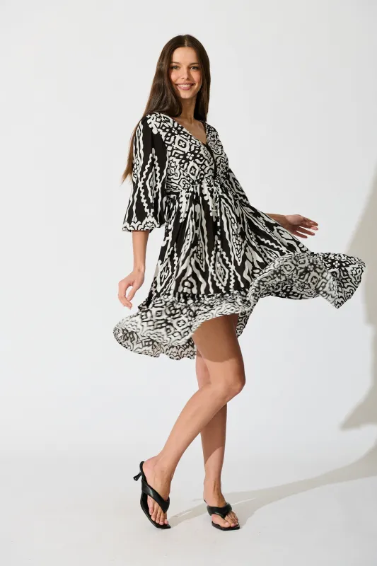 Allora Dress in Black and White Boho Print sold by St Frock