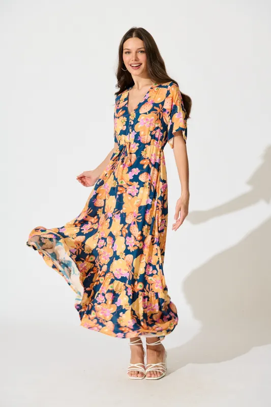 Silhariah Maxi Dress in Navy with Tangarine Floral sold by St Frock