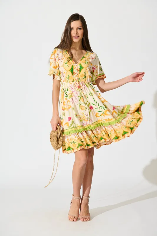 Tiley Dress in Beige with Multi Floral Print sold by St Frock