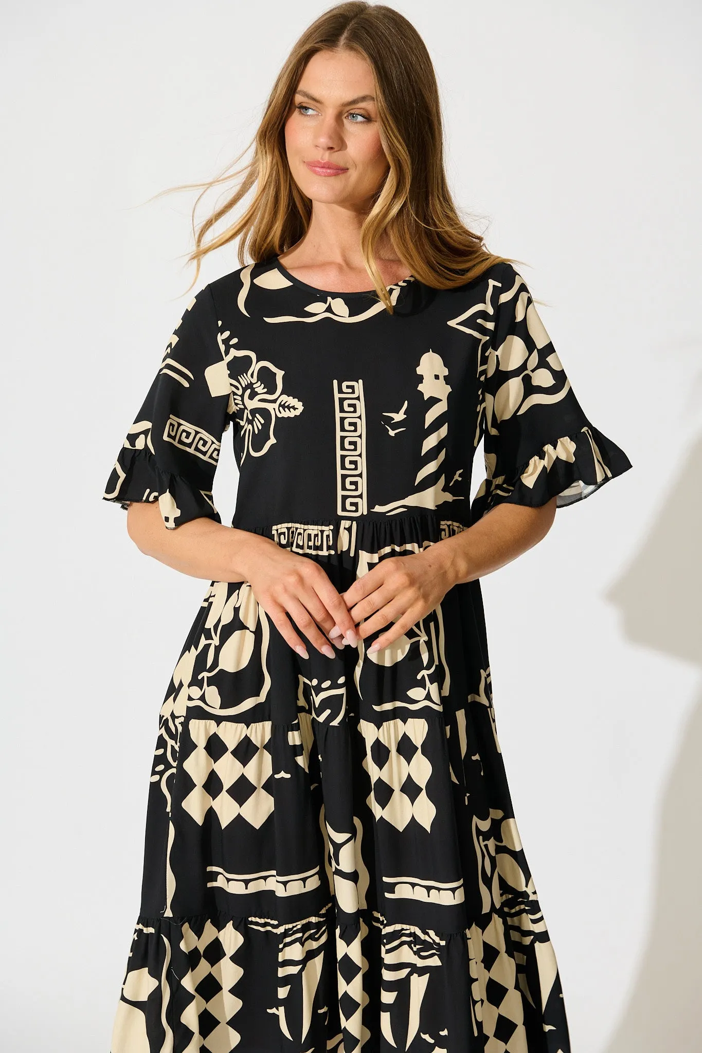 Layana Midi Dress in Black with White Print sold by St Frock product image thumbnail 2