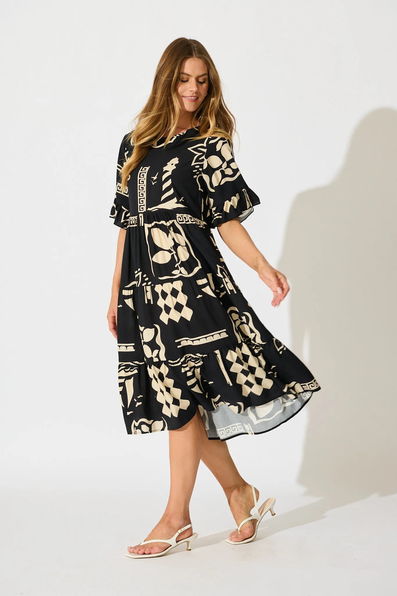 Layana Midi Dress in Black with White Print sold by St Frock product image thumbnail 3