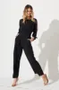 Juno Jumpsuit in Black sold by St Frock