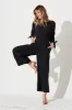 Juno Jumpsuit in Black sold by St Frock