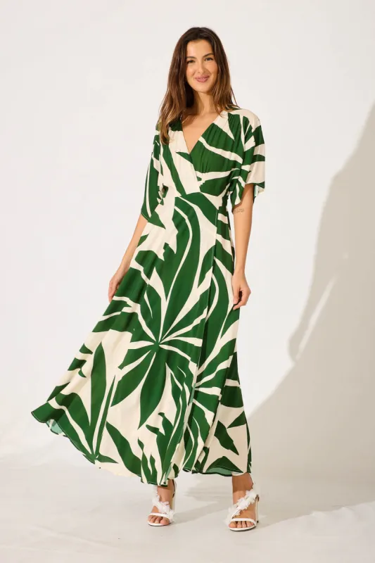 Rondi Maxi Wrap Dress In Khaki With Cream Leaf Print sold by St Frock