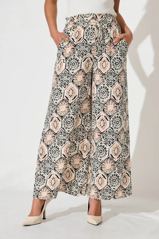 Goldie Wide Leg Pant In Cream With Rust Tile Print sold by St Frock