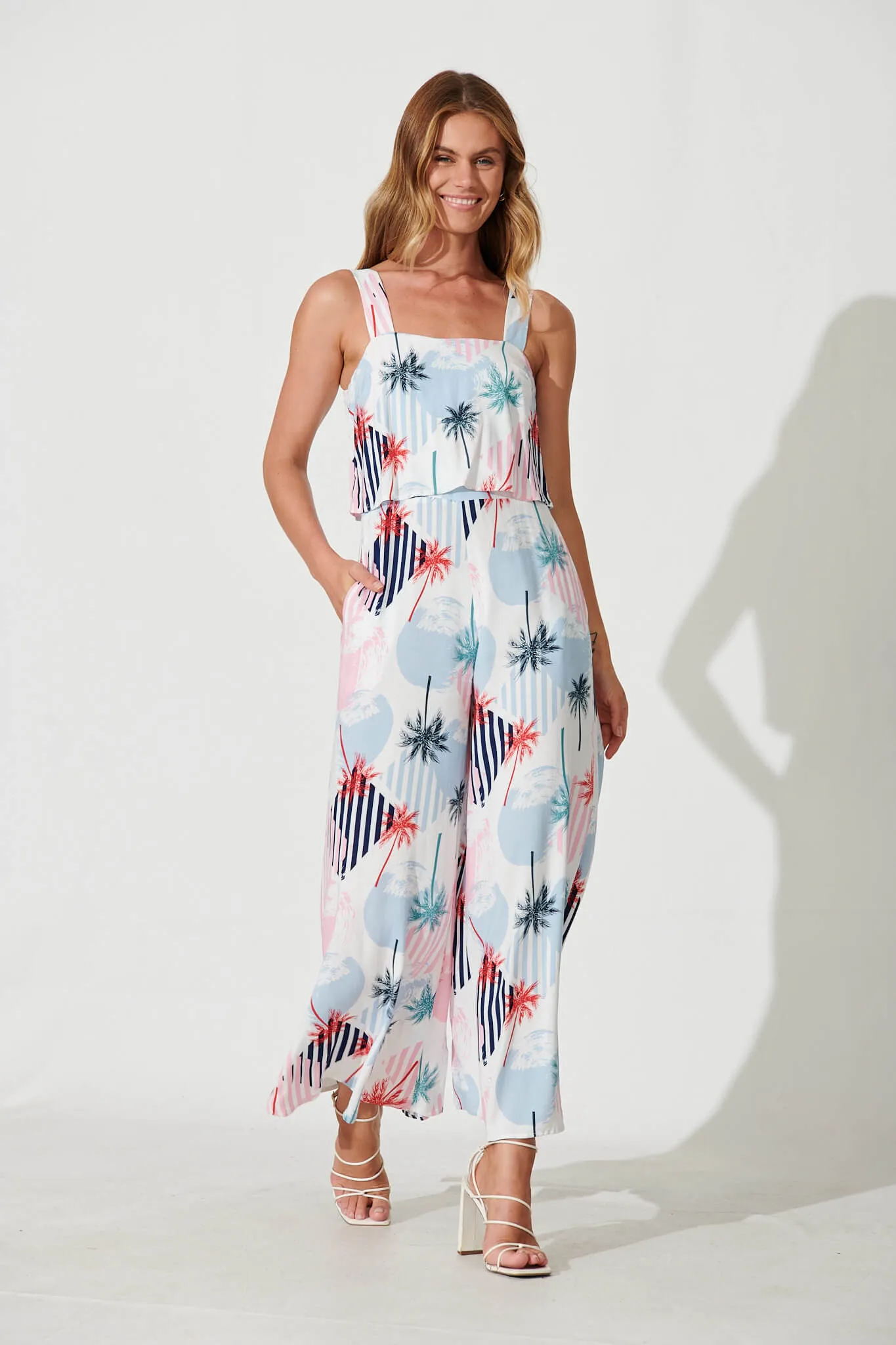 Sandcastle Jumpsuit In White Multi Palm Print sold by St Frock