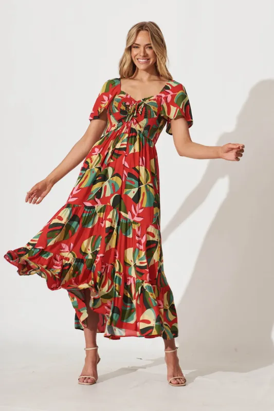 Aiyana Maxi Dress In Red With Green Leaf Print sold by St Frock