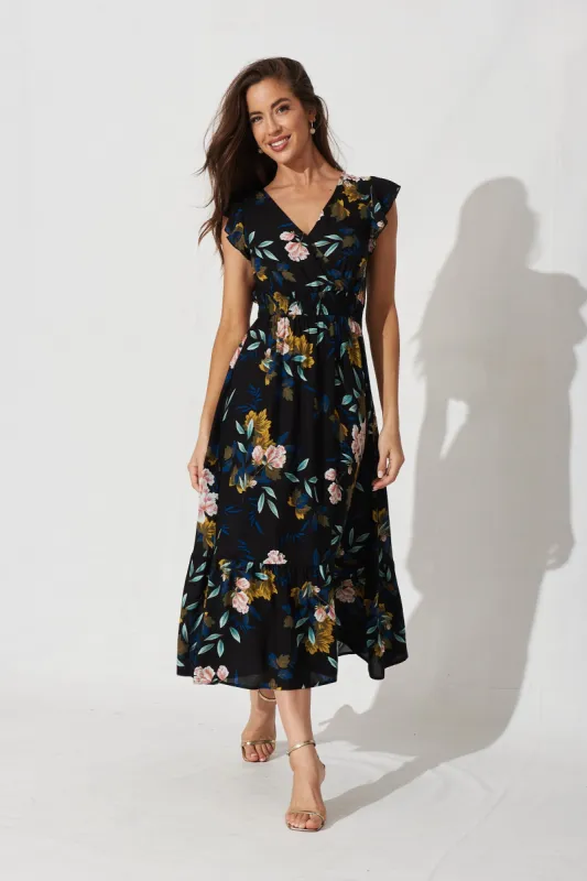 Pescara Midi Dress In Black With Green Leaf sold by St Frock