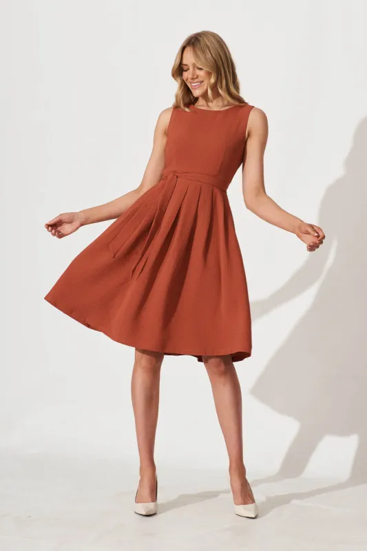 Jardin Dress In Textured Rust sold by St Frock