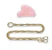 The Strawberry Quartz Pebble Mini Bag & Crystal Beauty Kit sold by Stone and Mason