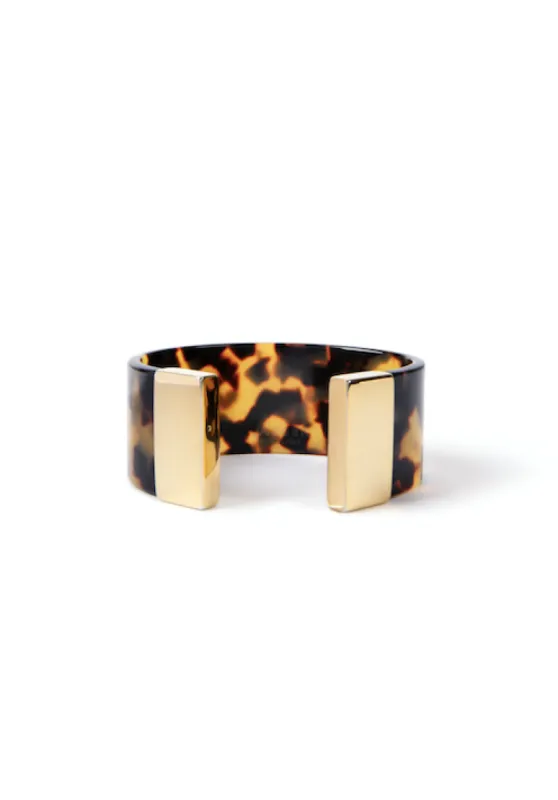 Gold Tortoiseshell Bangle sold by Stone and Mason
