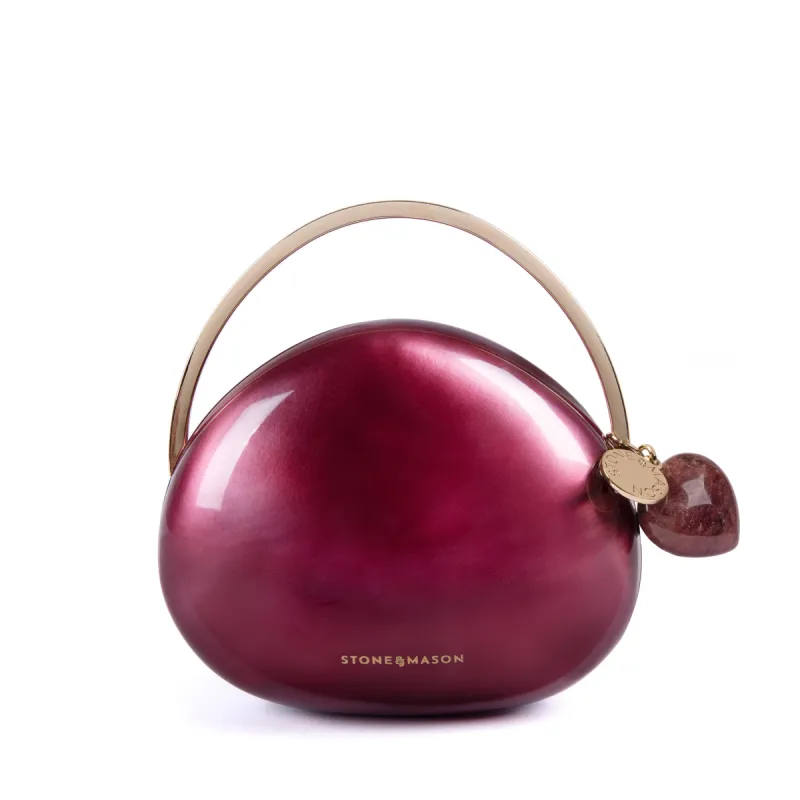 The Strawberry Quartz Pebble Mini Bag & Crystal Beauty Kit with Heart Charm sold by Stone and Mason
