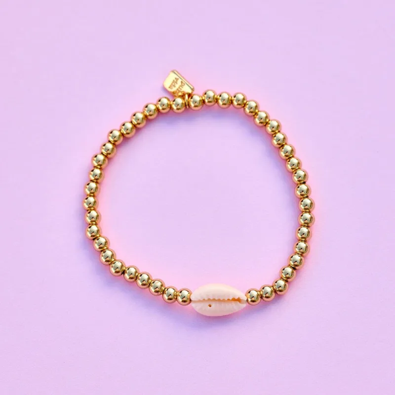 Pura Vida Bracelets Cowrie Bead Stretch Bracelet - GOLD sold by Sun Diego Boardshops