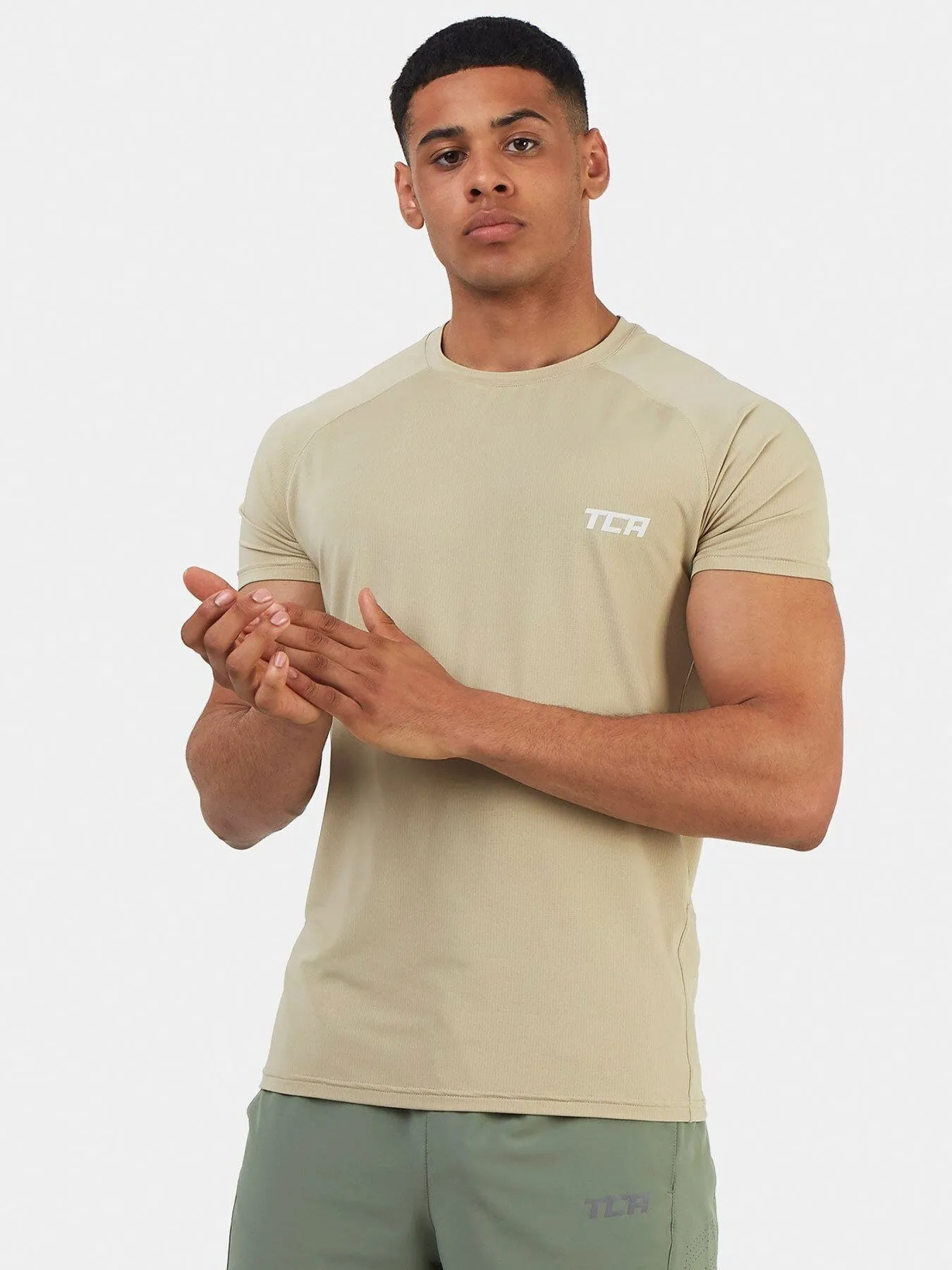 Stamina Short Sleeve Crew Neck Running Top For Men With Back Zip Pocket sold by TCA