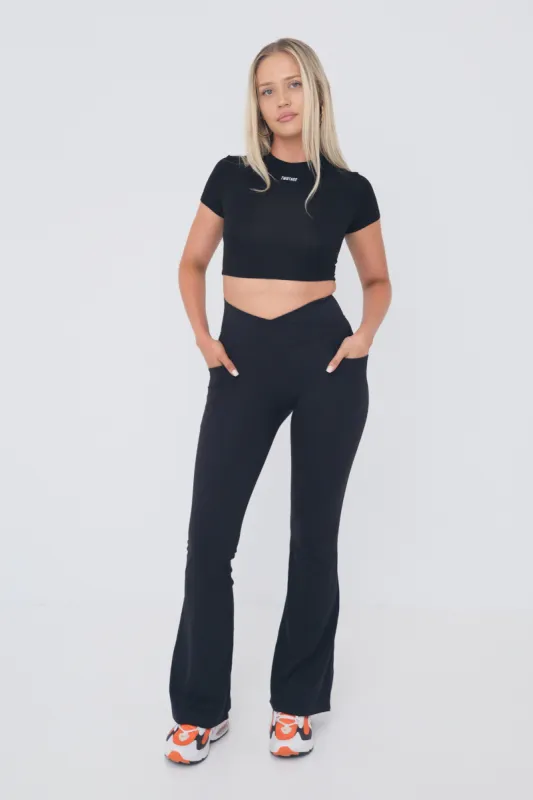 Cross Over Flare Pocket Leggings - Black sold by TWOTAGS