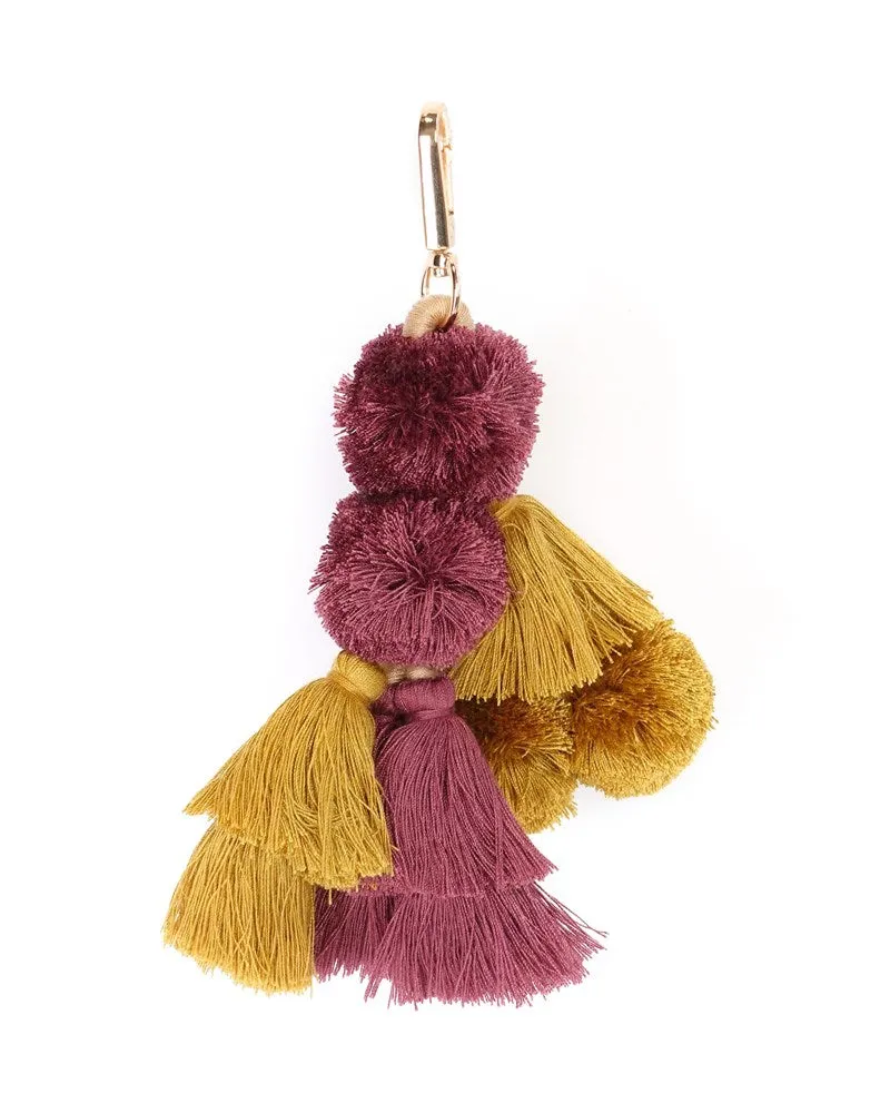 Large Pom Pom Mustard & Plum sold by The Somewhere Co.