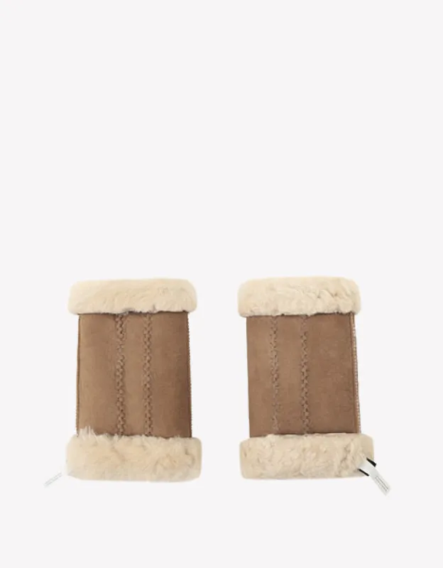 AUSTRALIAN SHEPHERD® Fingerless Sheepskin Mittens sold by The UGG Shop