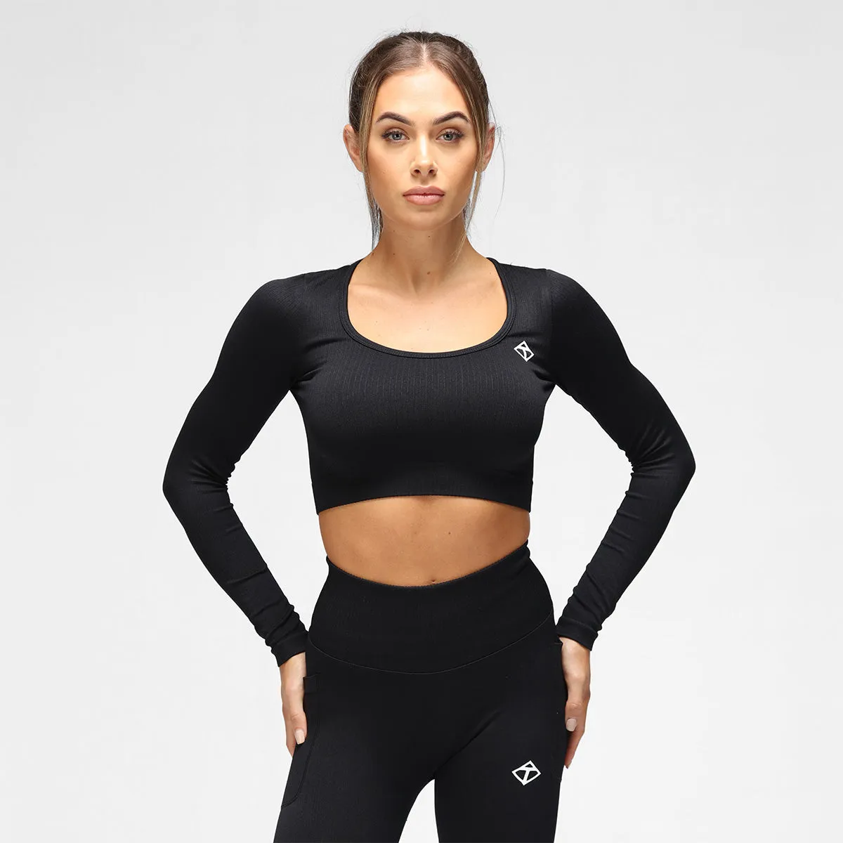 Black Ribbed Seamless Long Sleeved Crop Top sold by Tikiboo