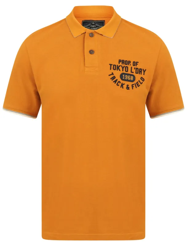 Kaikoura 2 Applique Cotton Pique Polo Shirt in Buckhorn Brown - Tokyo Laundry sold by Tokyo Laundry