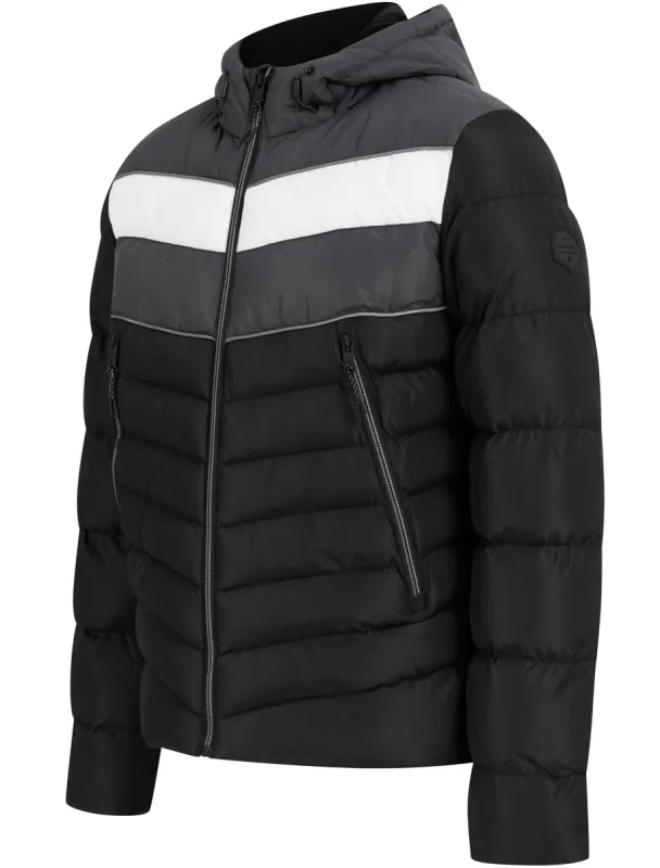 Devonte Chevron Quilted Puffer Jacket with Hood in Jet Black - Dissident sold by Tokyo Laundry