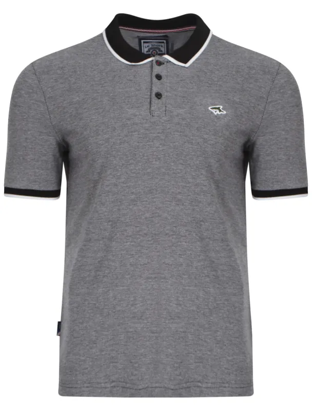 Le Shark Bramshaw black polo shirt sold by Tokyo Laundry