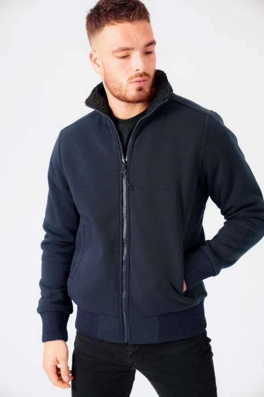 Percy Funnel Neck Zip Through Chunky Sweat With Borg Lining In Iris Navy - Dissident sold by Tokyo Laundry