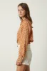 JOCELYN GEO PRINT CREPE TOP IN ORANGE sold by Velvet Tees