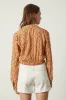 JOCELYN GEO PRINT CREPE TOP IN ORANGE sold by Velvet Tees