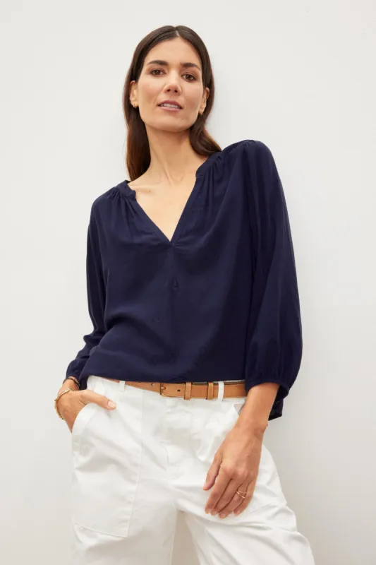 ASHLEY V-NECK TOP IN POSTMAN sold by Velvet Tees