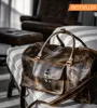 The “Hemingway” Buffalo Leather Duffle Bag sold by Vintage Gentlemen