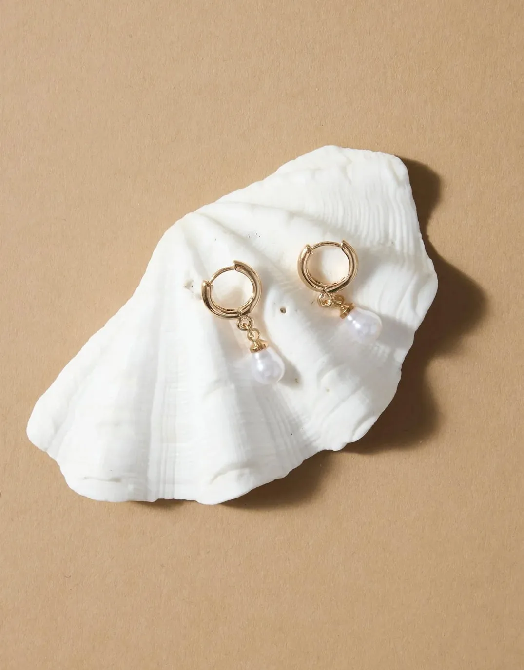Mini Pearl Huggie Earrings - Gold sold by White & Co product image thumbnail 3