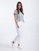 Tommy Jean - White sold by White & Co