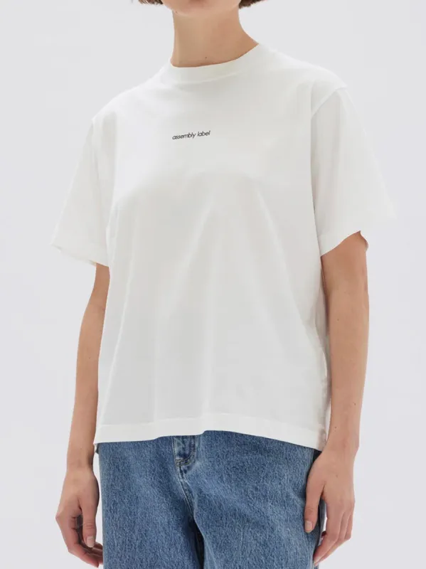 ASSEMBLY LABEL EXHIBITED PRINT SHORT SLEEVE TEE sold by Yeltuor