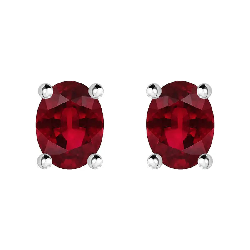 18ct White Gold Ruby 4x3mm Oval Claw Set Stud Earrings D sold by Jura Watches