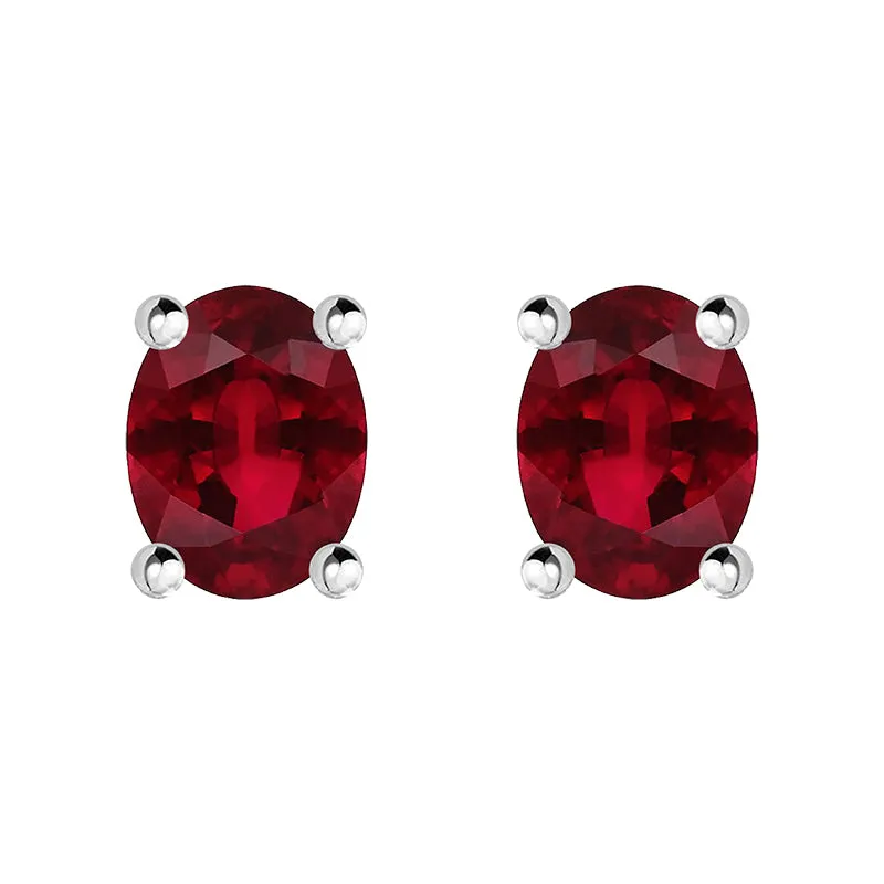 18ct White Gold Ruby 4x3mm Oval Claw Set Stud Earrings D sold by Jura Watches
