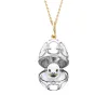 Faberge Heritage 18ct Gold White Enamel Locket with Seal Surprise sold by Jura Watches