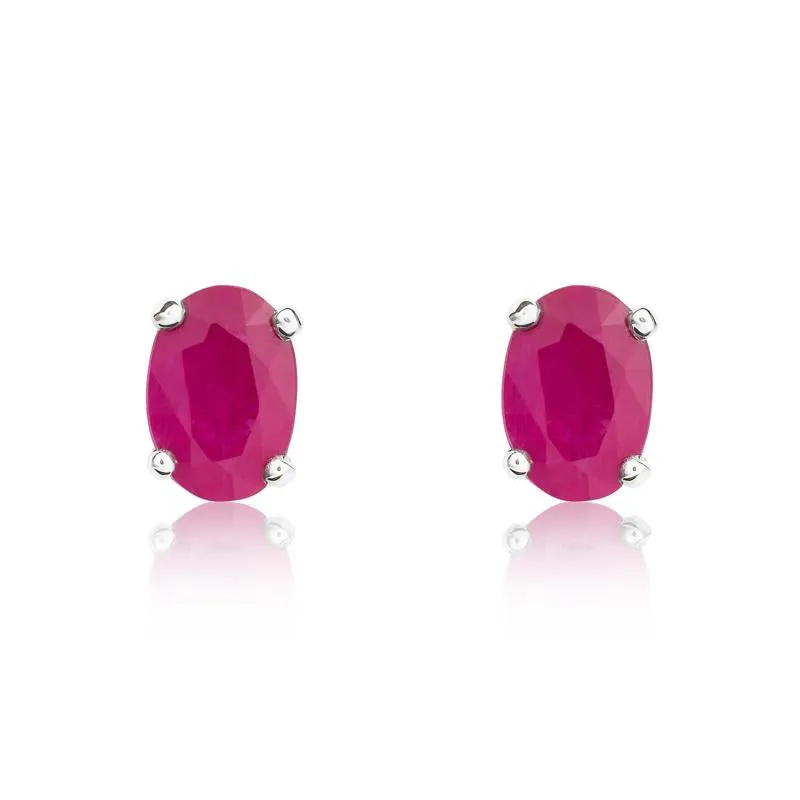 9ct White Gold Ruby 6x4mm Oval Claw Set Stud Earrings sold by Jura Watches