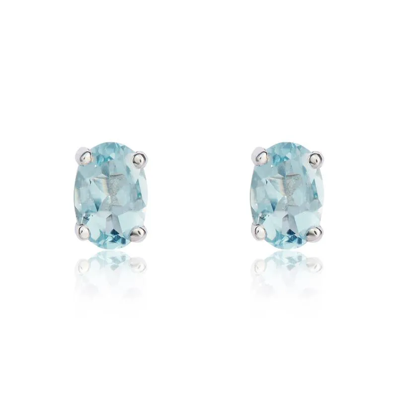 9ct White Gold Aquamarine 6x4mm Oval Claw Set Stud Earrings sold by Jura Watches
