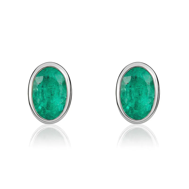9ct White Gold Emerald 5x3mm Oval Rub Over Set Stud Earrings sold by Jura Watches