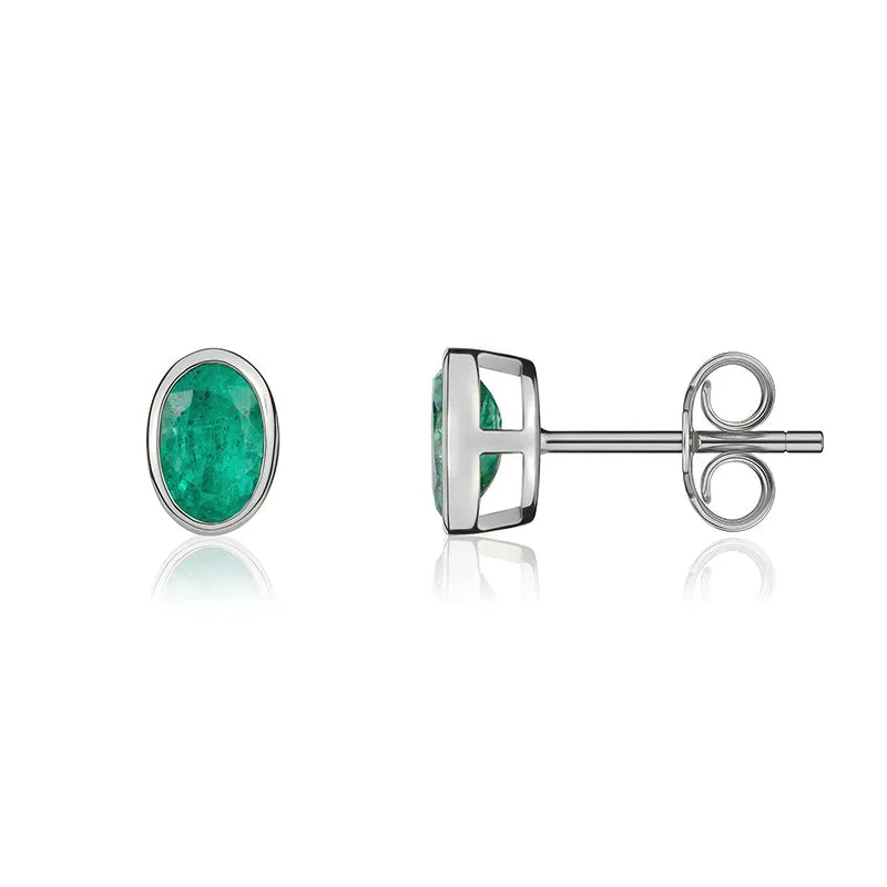 9ct White Gold Emerald 5x3mm Oval Rub Over Set Stud Earrings sold by Jura Watches product image thumbnail 2