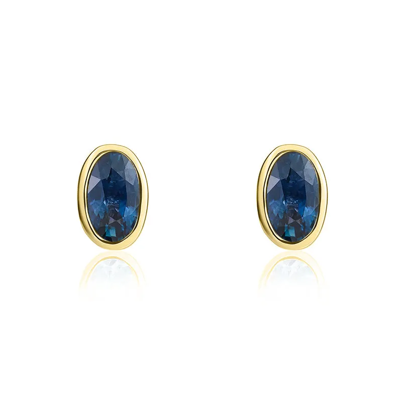 9ct Yellow Gold Sapphire 5x3mm Oval Rub Over Set Stud Earrings sold by Jura Watches