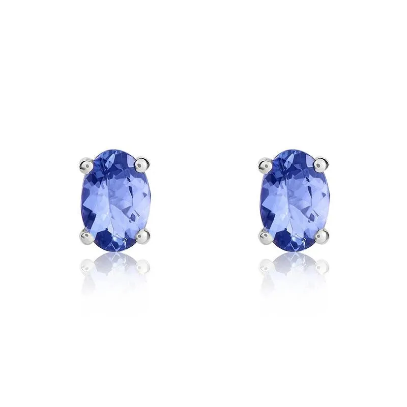 9ct White Gold Tanzanite 6x4mm Oval Claw Set Stud Earrings sold by Jura Watches