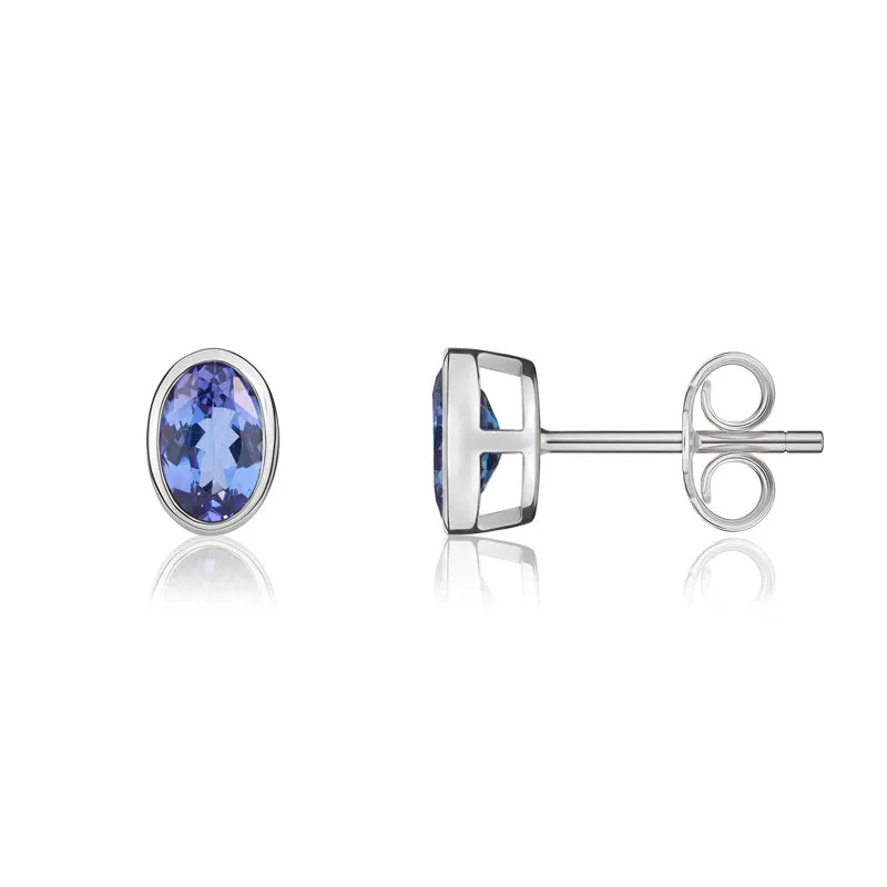 9ct White Gold Tanzanite 6x4mm Oval Rub Over Set Stud Earrings sold by Jura Watches product image thumbnail 2