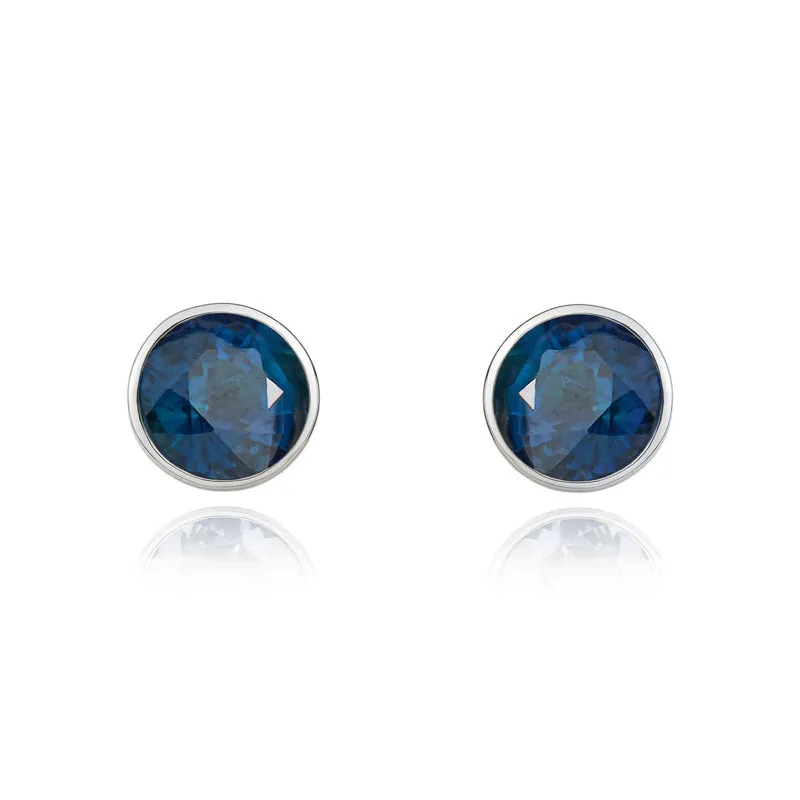9ct White Gold Sapphire 5mm Round Rub Over Set Stud Earrings sold by Jura Watches