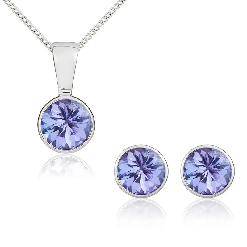 9ct White Gold Tanzanite 5mm Round Rub Over Set Pendant and Stud Earrings Set sold by Jura Watches