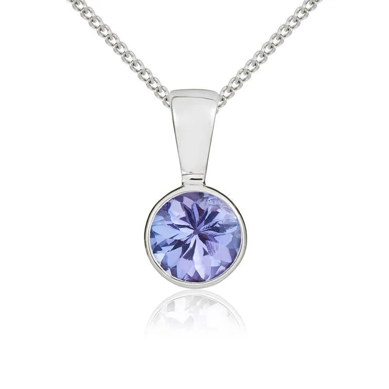 9ct White Gold Tanzanite 5mm Round Rub Over Set Pendant and Stud Earrings Set sold by Jura Watches product image thumbnail 2