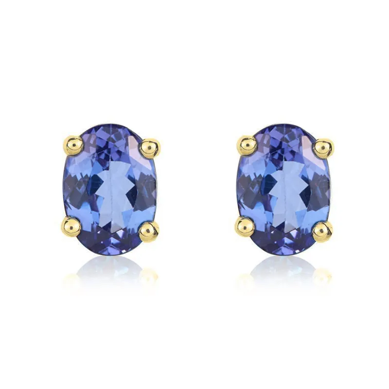 9ct Yellow Gold Tanzanite 7x5mm Oval Claw Set Stud Earrings sold by Jura Watches
