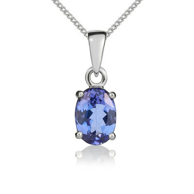 9ct White Gold Tanzanite 7x5mm Oval Claw Set Pendant and Stud Earrings Set sold by Jura Watches product image thumbnail 2