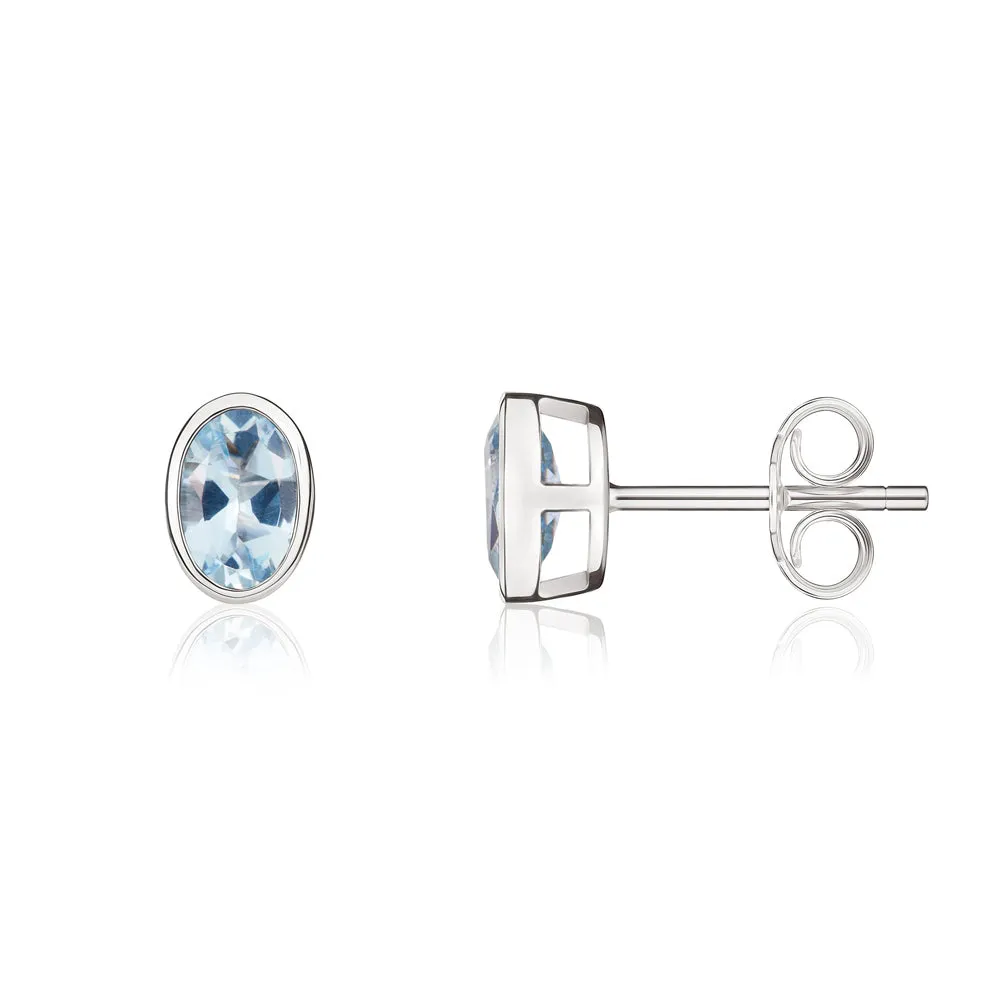 9ct White Gold Aquamarine 6x4mm Oval Rub Over Set Stud Earrings sold by Jura Watches product image thumbnail 2